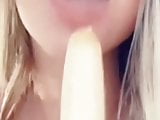 Maca suckin on banana